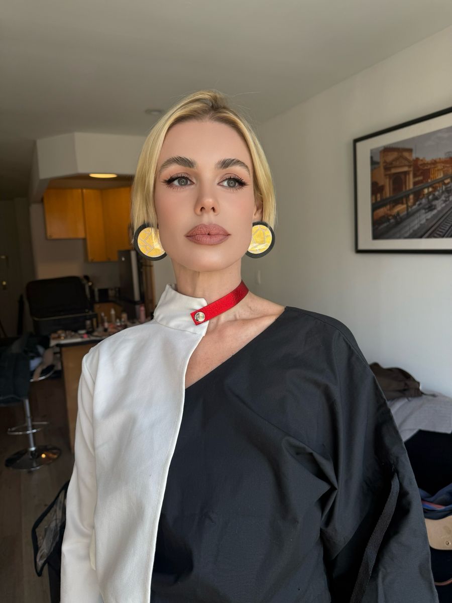 Editorial makeup look with bold accessories